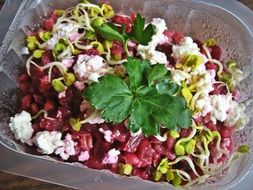 kaszotto with herbs in a container