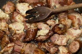 fried assorted meat on a pan