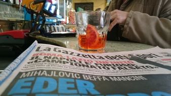 newspaper on the table in the bar