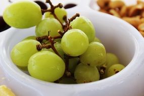 green grapes in a white bowl