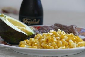 avocado and corn on a plate