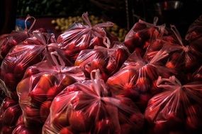 tomatos packed in plastic bag food