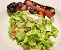 dainty bbq sausage and green salad