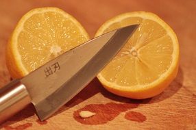 sliced lemon on a wooden board