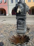 drinking water in the town square