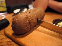 cutting of the black loaf