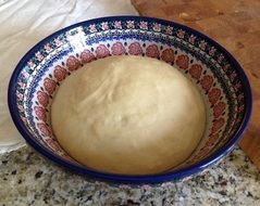 dough for baking in a bowl