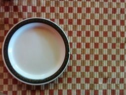 plate on the tablecloth