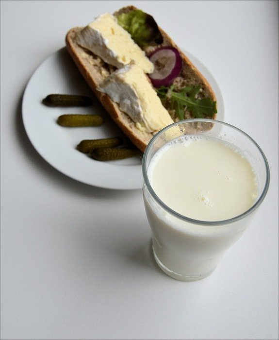 sandwich and a glass of milk for breakfast