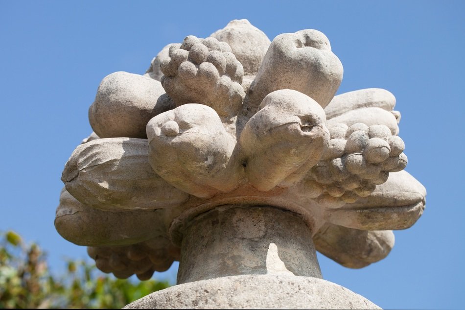 stone sculpture of fruits