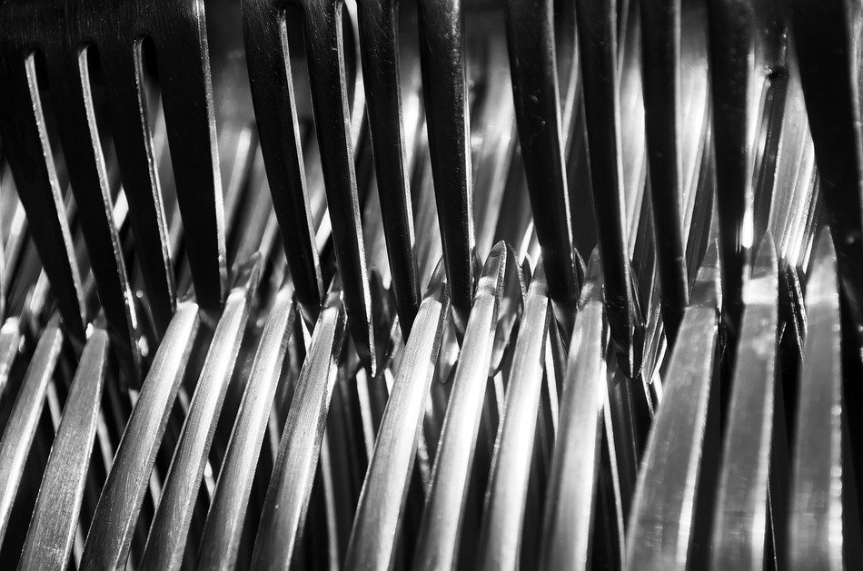Monochrome photo of metal dishware