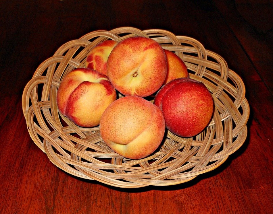 peaches in a wicker basket