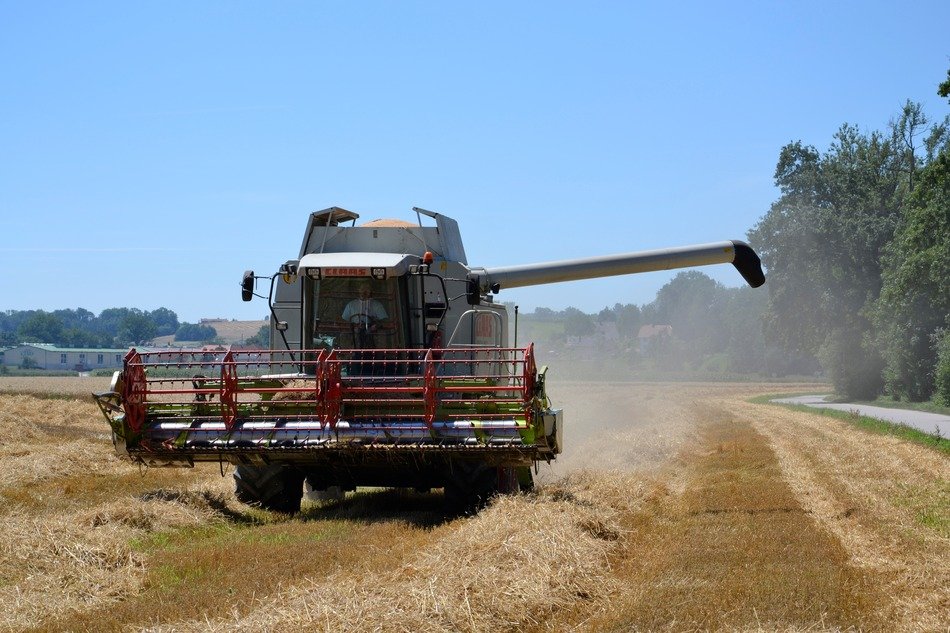 combine harvester bower on the field