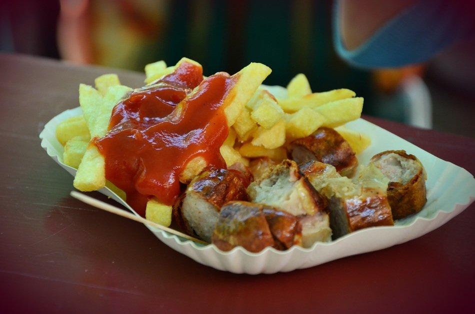 ketchup on french fries and currywurst sausages