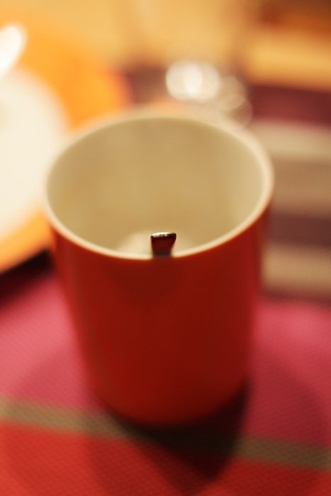 Coffee cup with a spoon