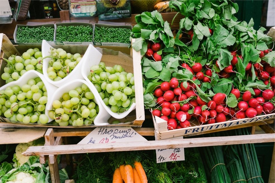 red radish and green grapes on the market