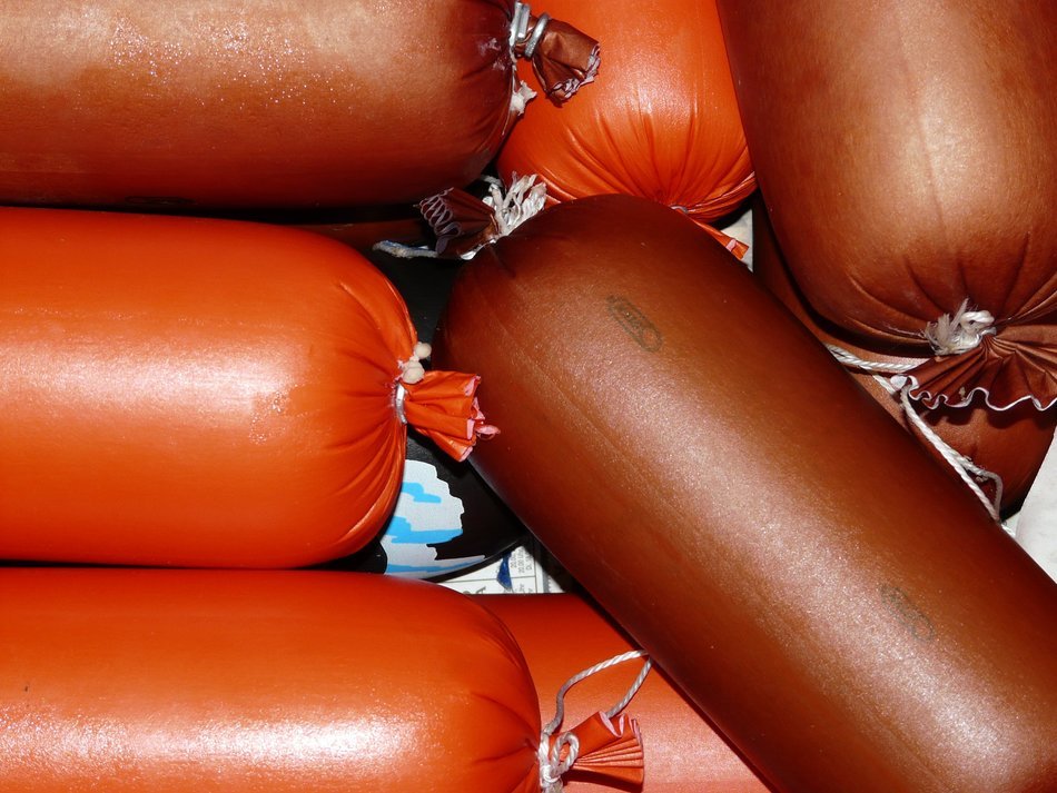 Colorful sausages in loaves
