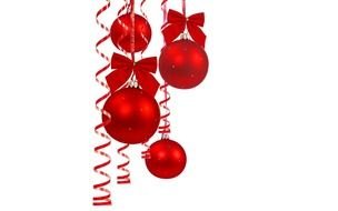 red balls hanging on red ribbons