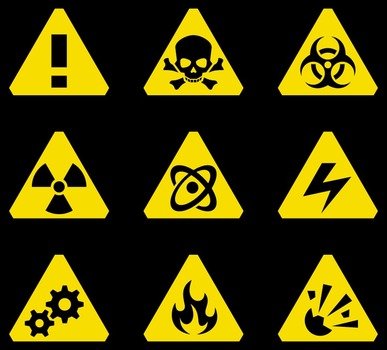 warning signs on a black background