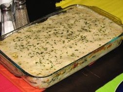 White Cheese Chicken Lasagna in a glass pan