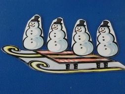 snowmen on the sleigh