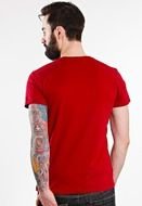 tattooed man in red t-shirt