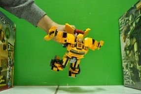 transformer toy in child hand