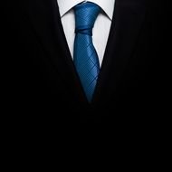 black suit and blue tie
