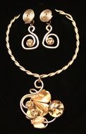 gold jewelry on a black background