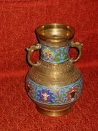 photo of a bronze vintage vase