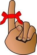 red ribbon on the finger as an illustration