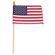 american flag on wooden stick