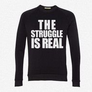 The Struggle Is Real as an inscription on a T-shirt