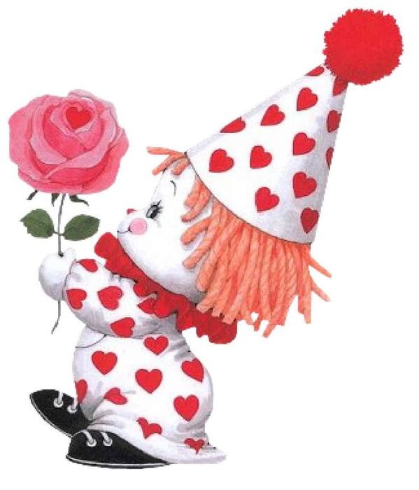 picture of a baby in a gnome costume with a rose in his hands