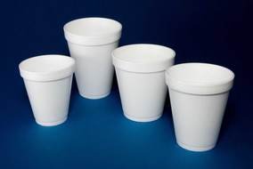photo of white glasses on a blue table