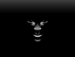 face on a black background