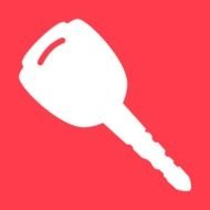 white silhouette of a key on a pink background