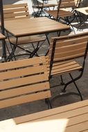 wooden tables and chairs in the restaurant