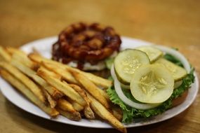 Fried potato with fresh cucumbers