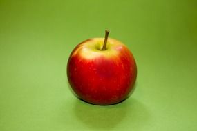 red apple with vitamins closeup