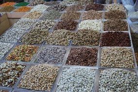 variety of legumes on the counter in the market