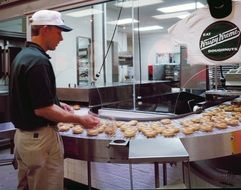 doughnut maker in hat