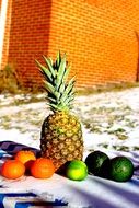 tangerines, limes and pineapple