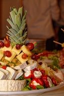 cheese plate and pineapple food