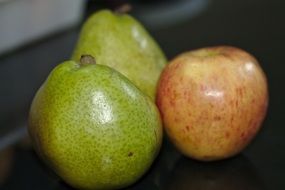 two pears and an apple