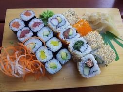 Sushi is a dish with rice and seafood