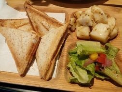 sandwiches and salad in a restaurant