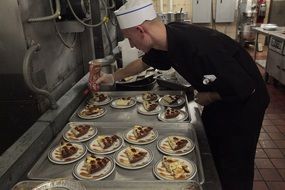 chef cooking cakes on a kitchen