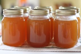 Peach jelly in glass jars