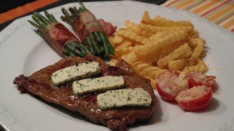 rumpsteak steak with beans bacon tomato fries